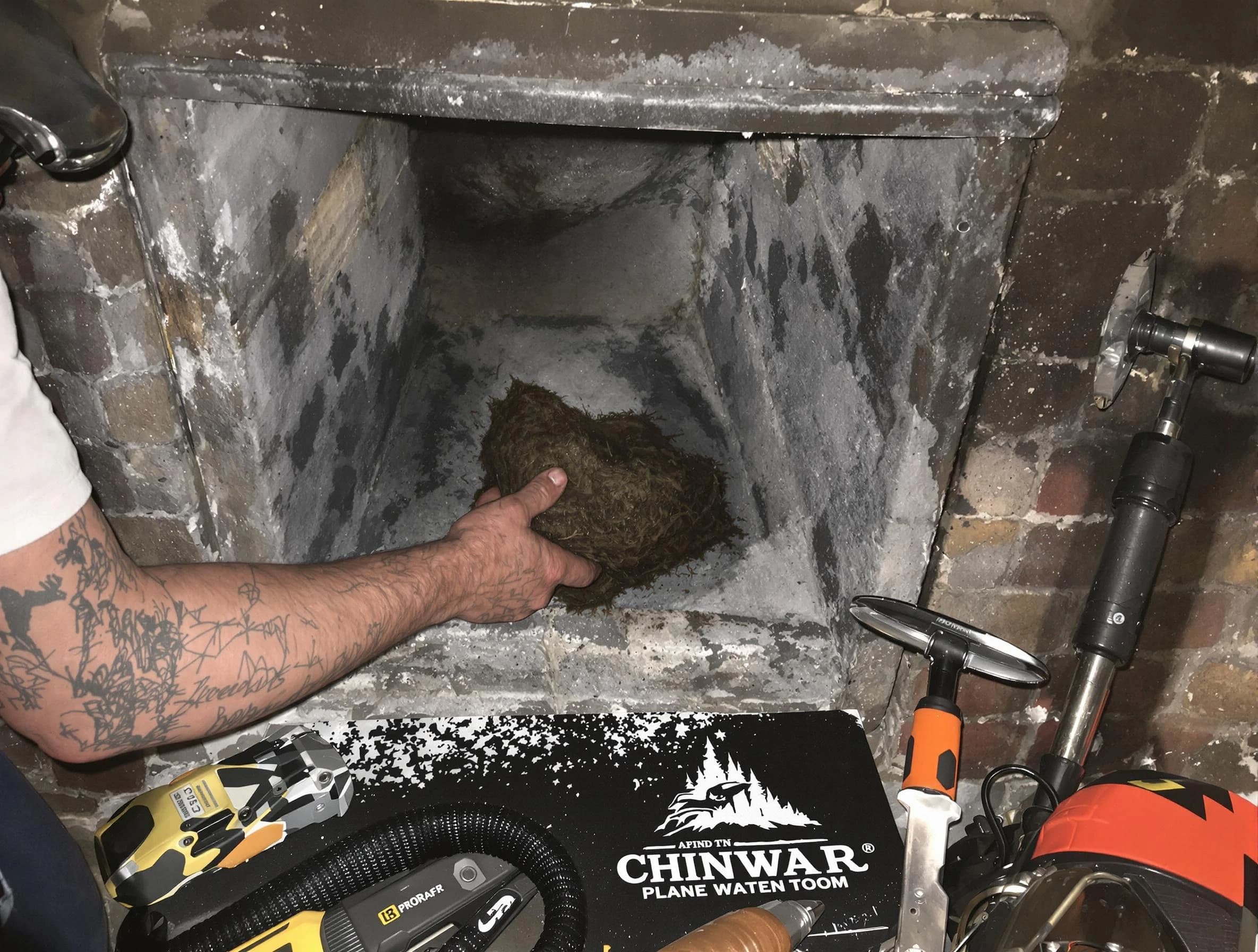 Brigham City Chimney Sweep safely removing debris and screening chimney in Brigham City, UT