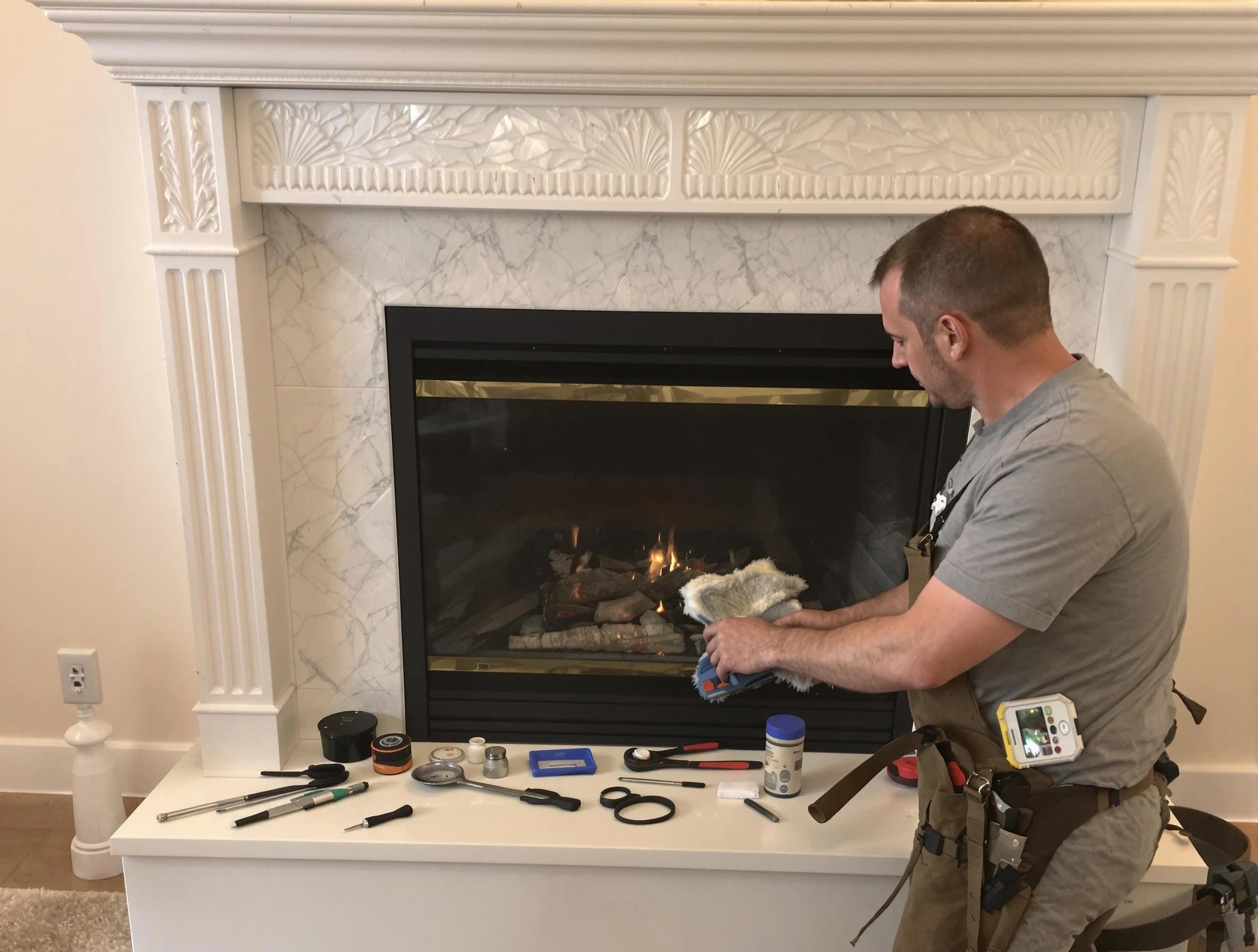 Brigham City Chimney Sweep performing fireplace maintenance in Brigham City, UT